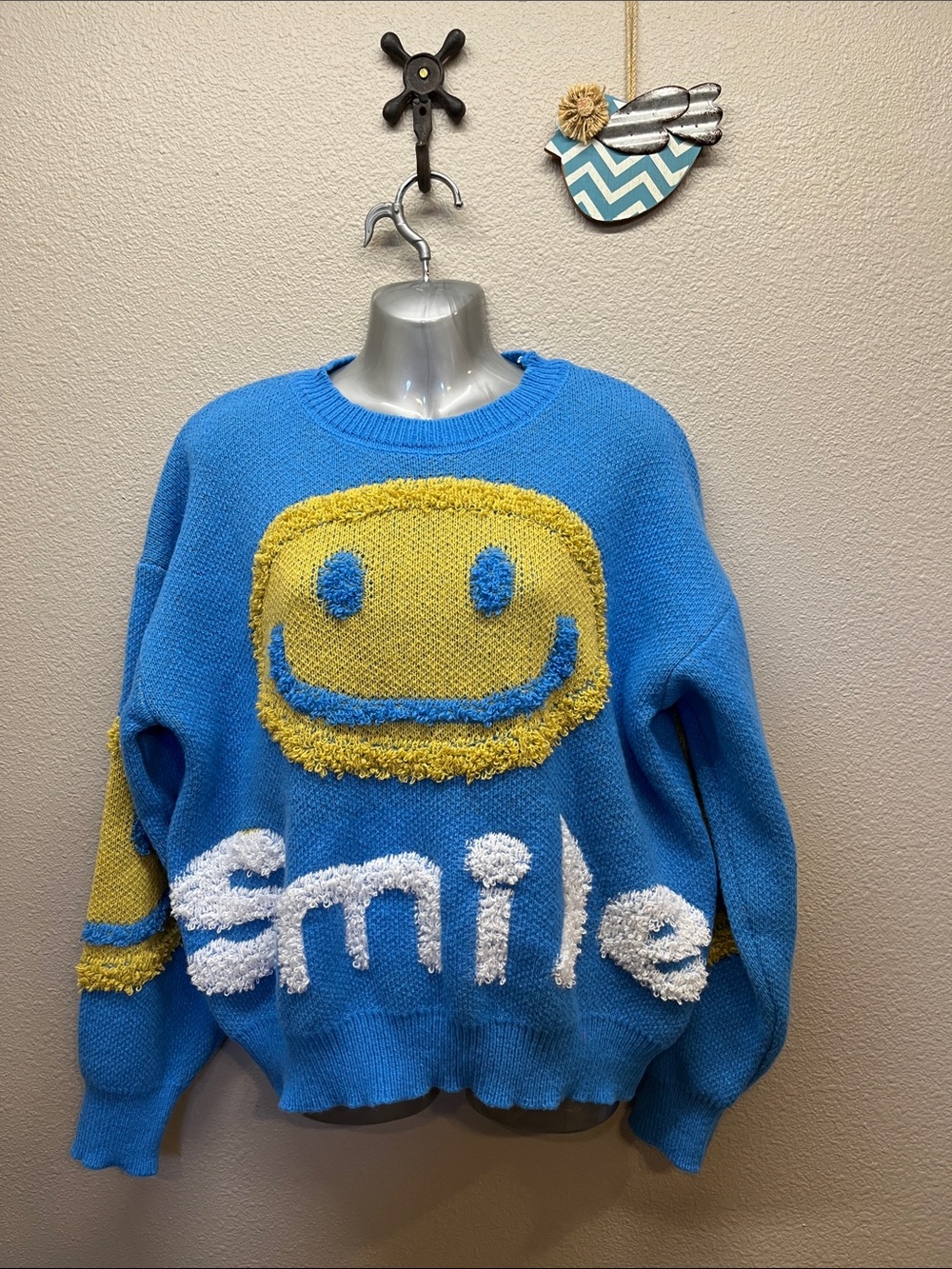 Smile sweater size Large